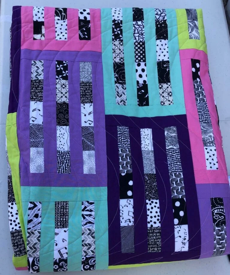 Past Fundraising Quilt Image 768x917.jpg